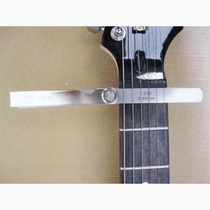 Feeler Gauge being used on guitar