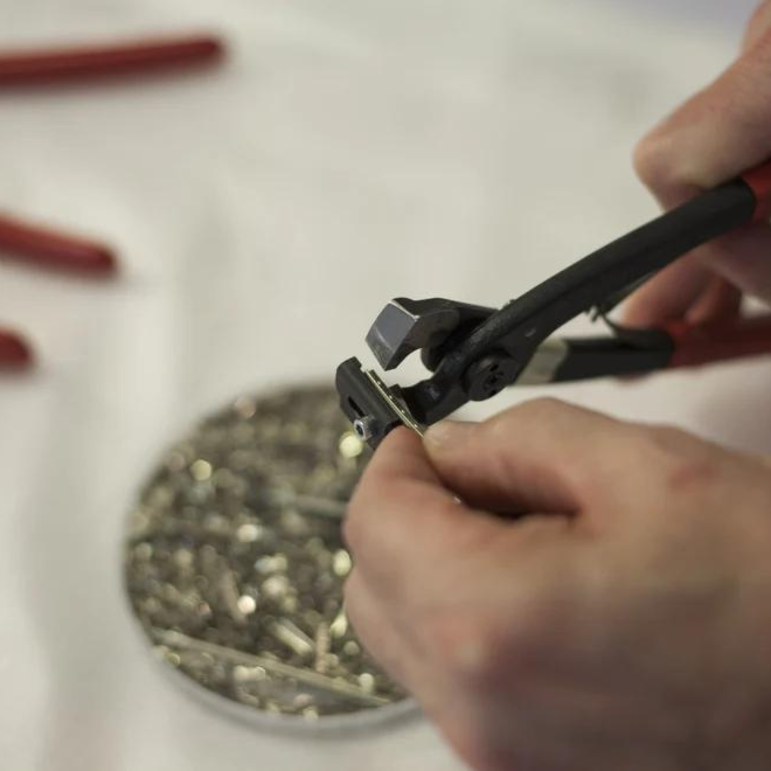 Fret tang cutter being used