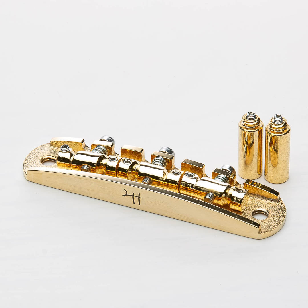 halon metric offset bridge w/ hardware angled view gold