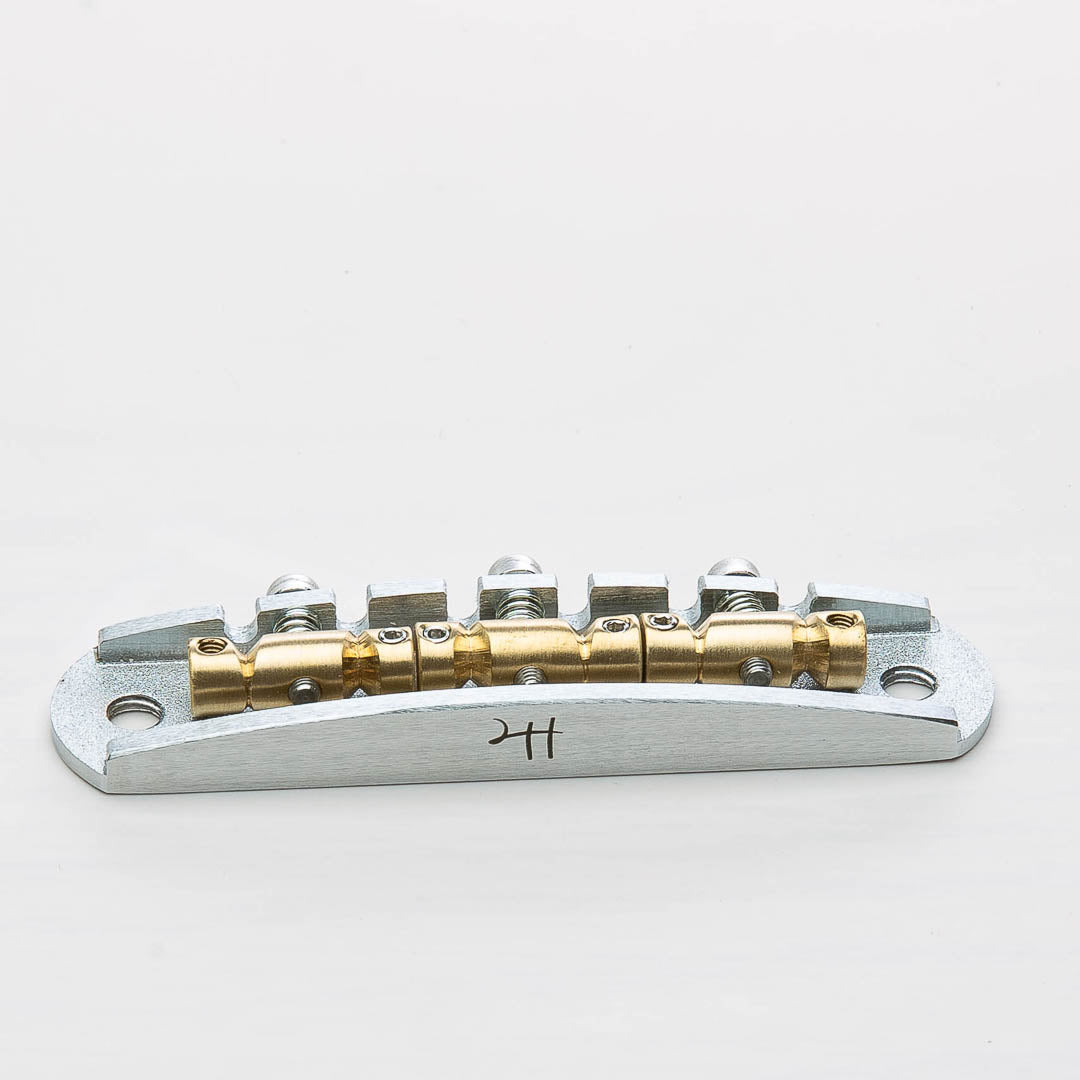 halon US-spec offset bridge w/ brass saddles front view satin chrome