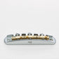 halon metric offset bridge w/ brass saddles front view chrome