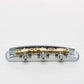 halon metric offset bridge w/ brass saddles back view chrome