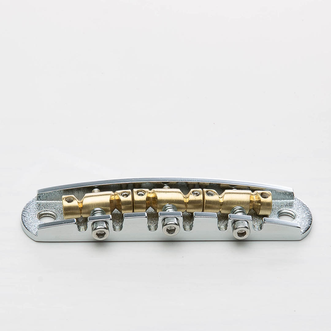 halon metric offset bridge w/ brass saddles back view chrome