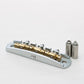 halon metric offset bridge w/ brass saddles front angled view w/ hardware chrome