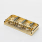 halon half tele bridge with brass saddles angled view gold