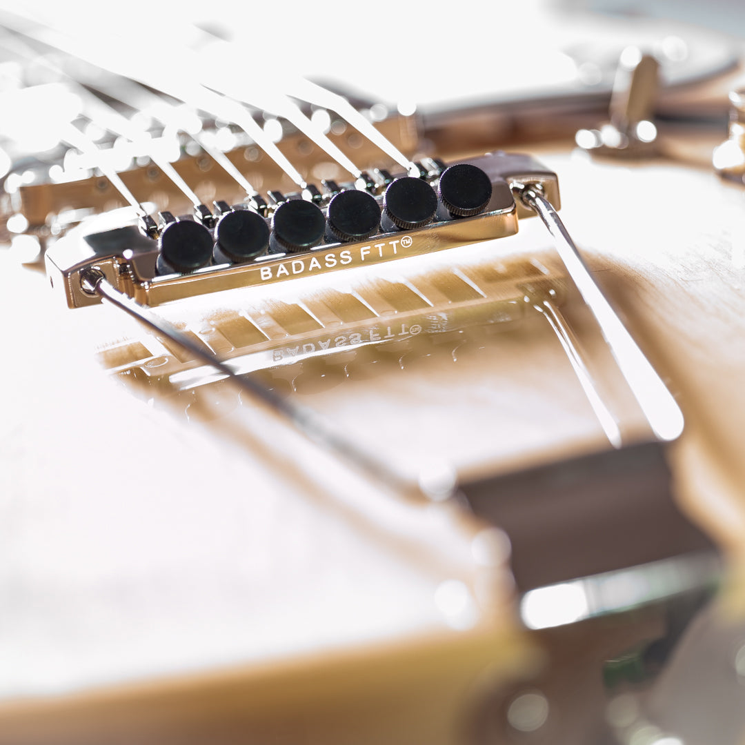 guitar tailpiece installed on guitar