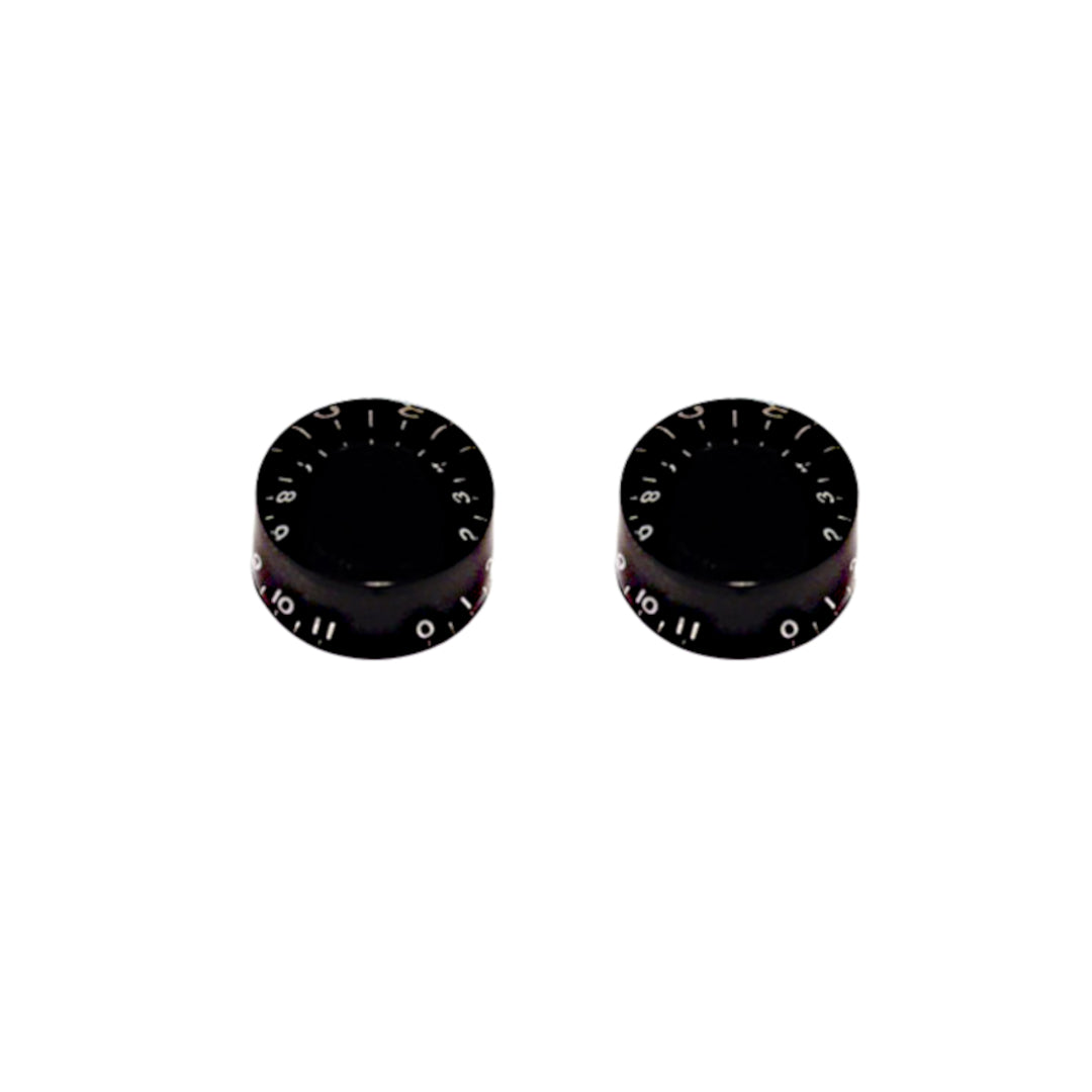 2 black volume knobs 0 to 11 