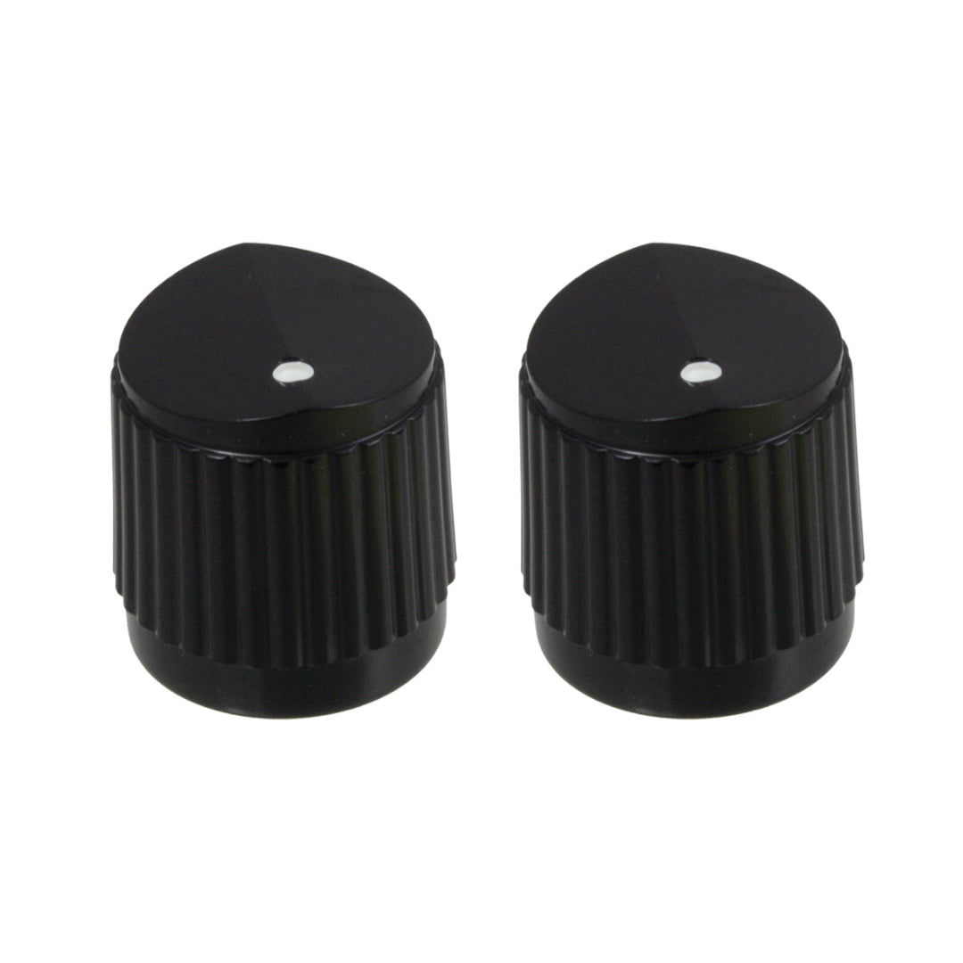 2 black knobs with a white dot