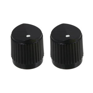 2 black knobs with a white dot