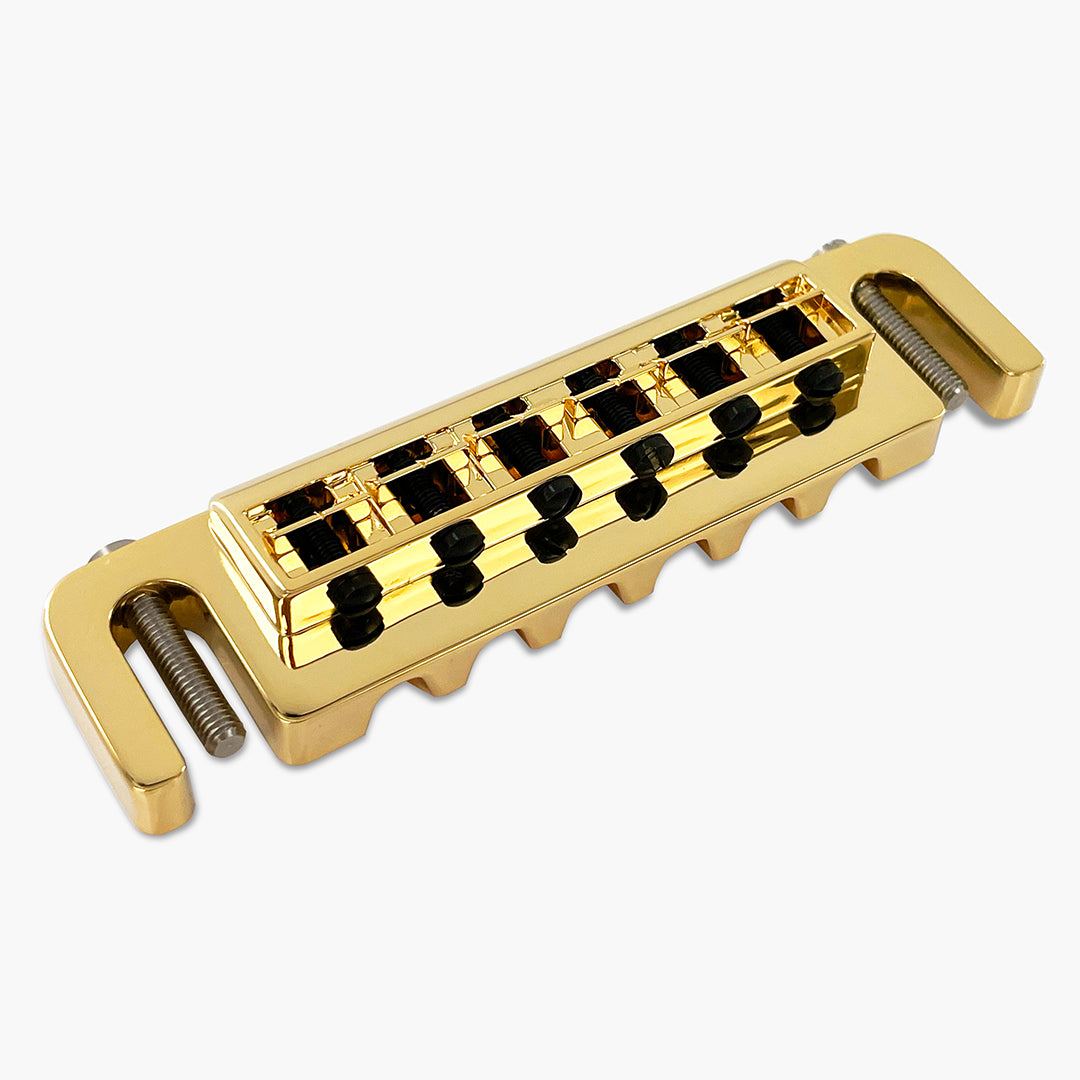 gold wraparound guitar bridge underneath