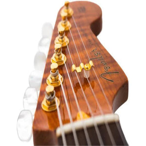 upward view of guitar headstock and strings