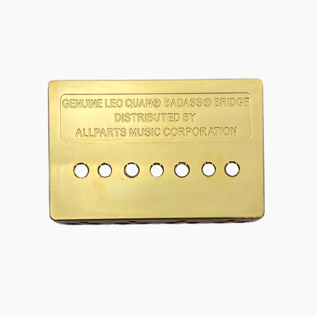 back side of gold 4 string bass bridge